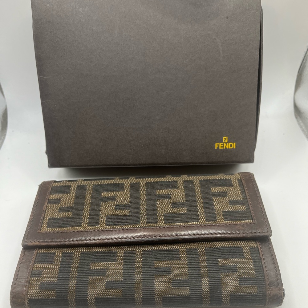 Authentic Fendi bifold wallet. Comes with the box.